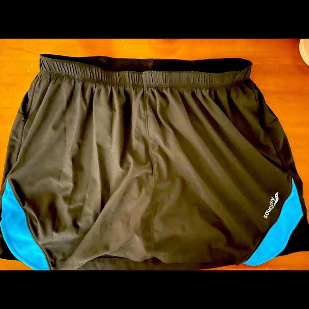 NWOT Black women’s Saucony skort. Worn once. Perfect condition.